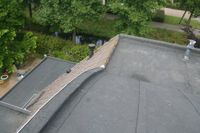 Collectief vernieuwen dakbedekking 23 woningen Wageningen
